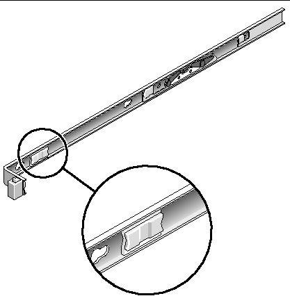 Image showing the slide rail release button near the from of the mounting bracket