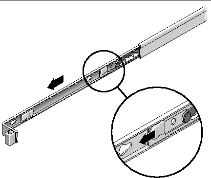 Image showing the plastic slide rail lock located in the middle of the mounting bracket. 