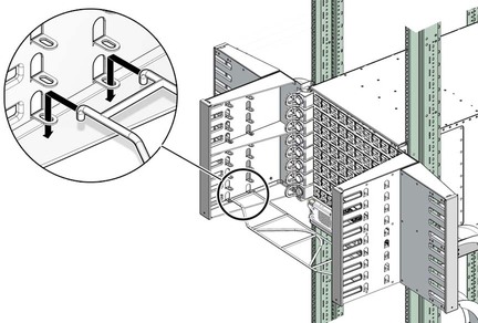 Illustration shows the cable shelf being installed.