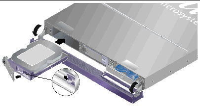 Figure shows open bezel and installation of hard drive into the Sun Fire V210 server.