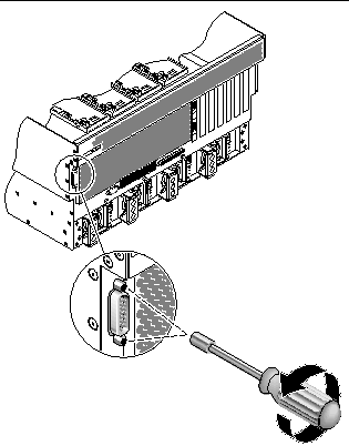 Figure showing how to remove the two screws that secure the alarm port connector to the rear of the system.