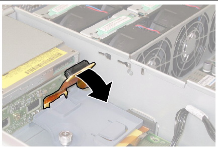 Disconnecting the flex-cable connector from the back of the DVD drive.