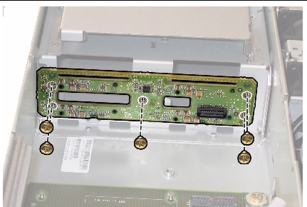 Removing hard disk drive backplane after removing its securing screws.