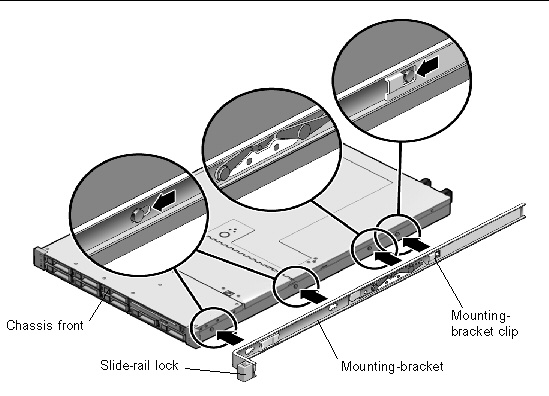 Graphic showing the mounting bracket being aligned with the chassis locating pins.