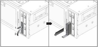 Removing a hard disk drive after pressing the button to release the securing latch.