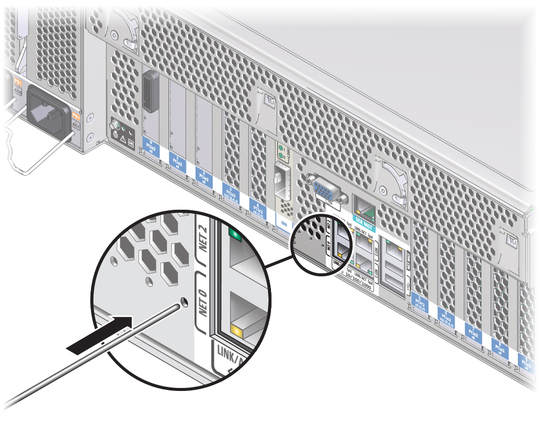 image:Figure showing the location of the physical presence hole near the NET 0 port.