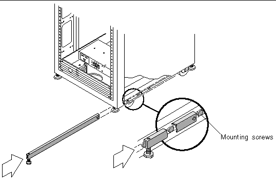 Illustration showing how to slide the stablizer legs onto the mounting screws at bottom of the cabinet. 