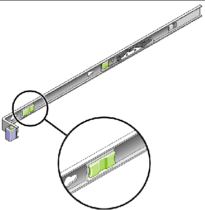 Image shows the slide rail release button near the from of the mounting bracket