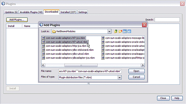 Image shows the Plugins Download dialog box with the
.nbm files needed to install the HL7 JCA Adapter