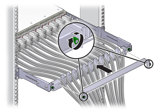 Illustration shows the cover being put on the cable management bracket.