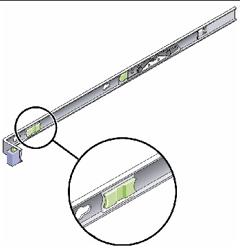 Figure showing the slide rail release button near the front of the mounting bracket.