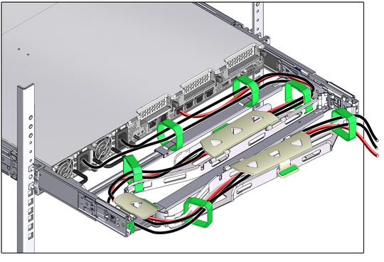 image:Figure showing CMA with cables installed, cable covers closed, and cables secured with Velcro straps.