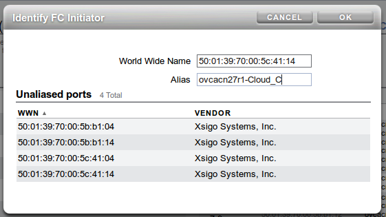 Figure showing the Identify FC Initiator dialog in the Oracle Storage Appliance ZS3-4 web user interface. A WWN has been selected from the list of Unaliased ports and an Alias is provided. The Alias should match the alias provided for the equivalent WWPN in the CLI when you run the list wwpn-info command.
