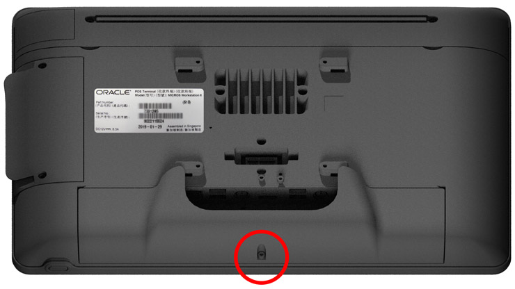 This figure shows the I/O Panel and the location of the security screw.