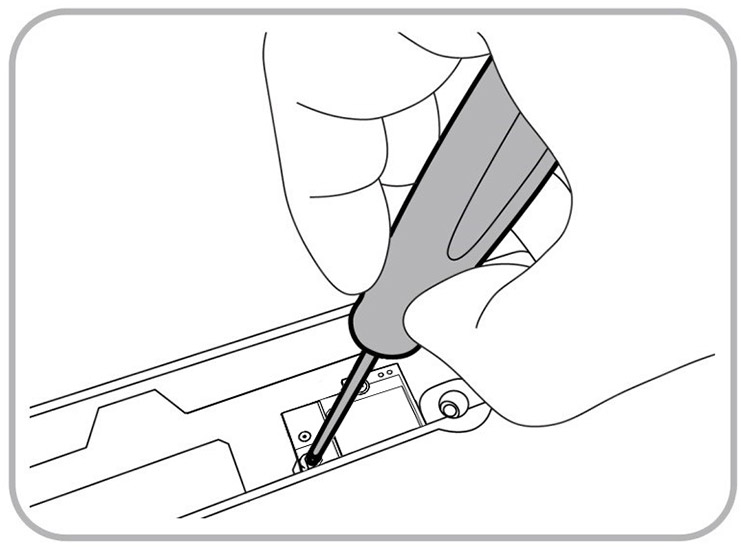 This figure shows a hand securing the wireless module with a screw.