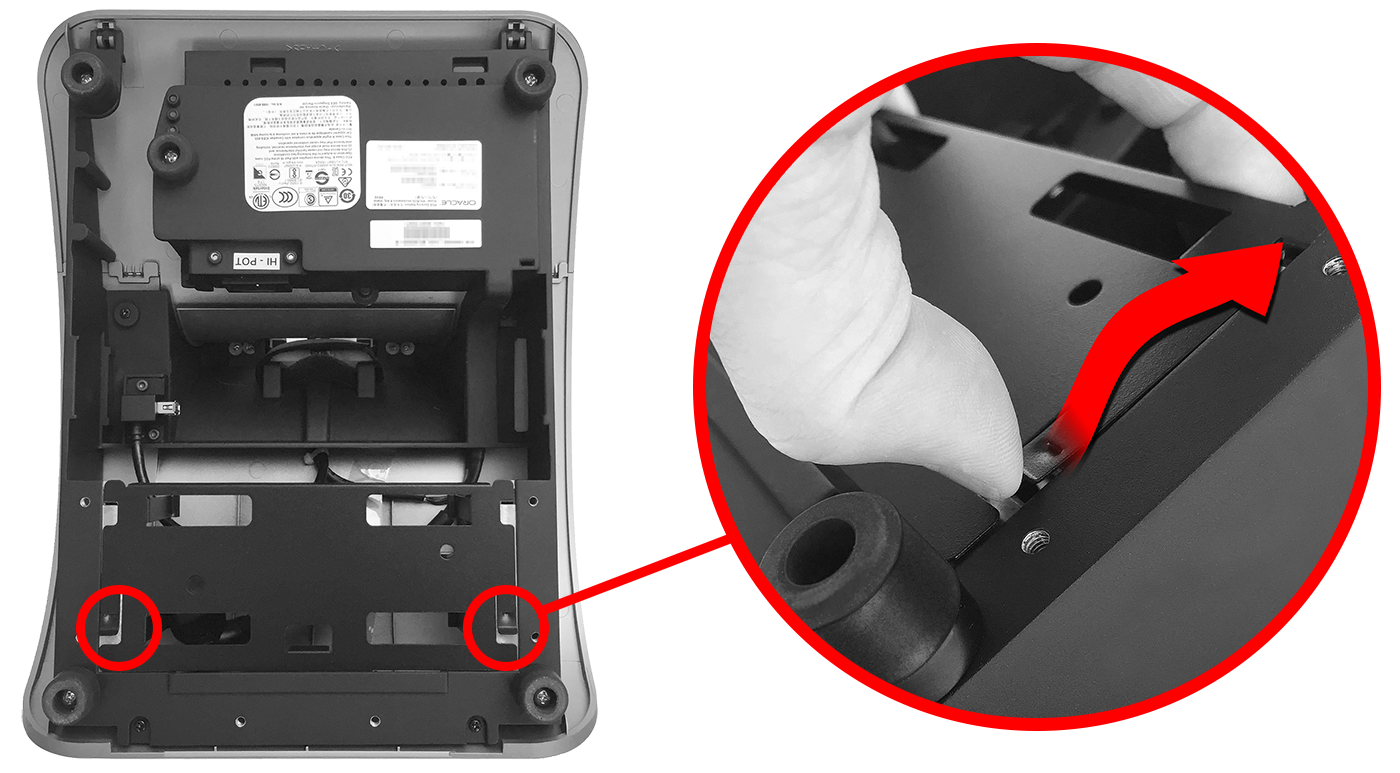 This figure shows a hand removing the power supply bracket.
