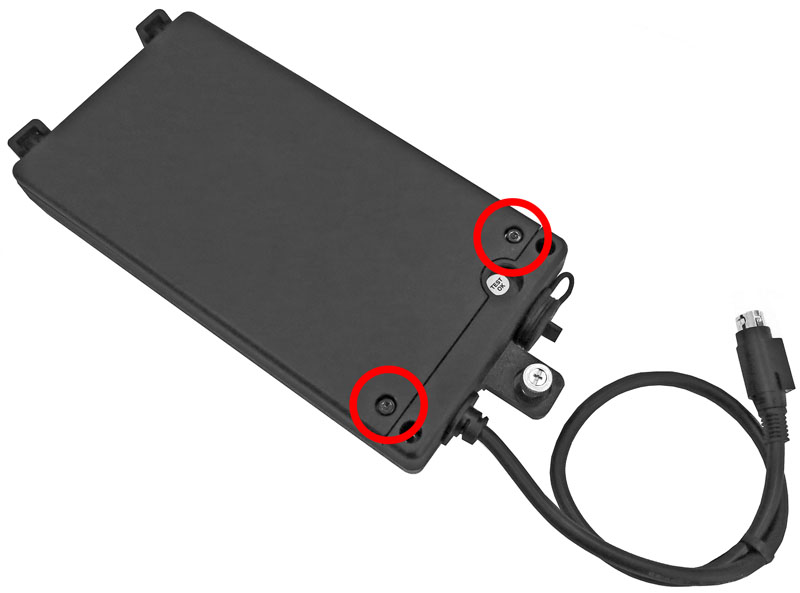 This image shows the enclosure with the two captive screws highlighted.