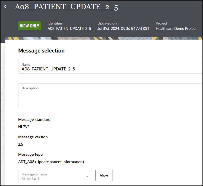 A08 Update Patient 2_5というメッセージが表示されます。 上部には、「表示のみ」ラベル、「識別子」フィールド、「更新日」フィールドがあります。 この下には、メッセージ選択の「名前」、「説明」、「メッセージ標準」、「メッセージ・バージョン」および「メッセージ・タイプ」フィールドがあります。 この下には、メッセージ・スキーマのドロップダウン・リストと「表示」ボタンがあります。 