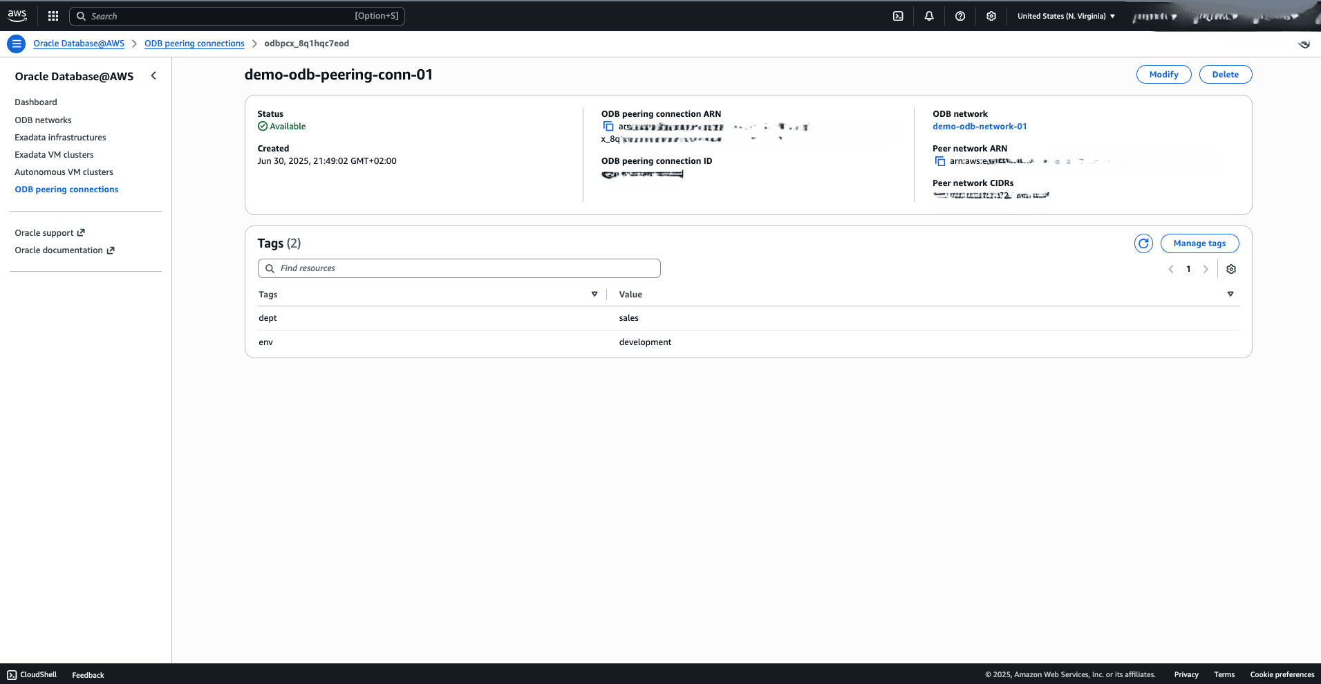 This screenshot shows how to modify an ODB peering connection.