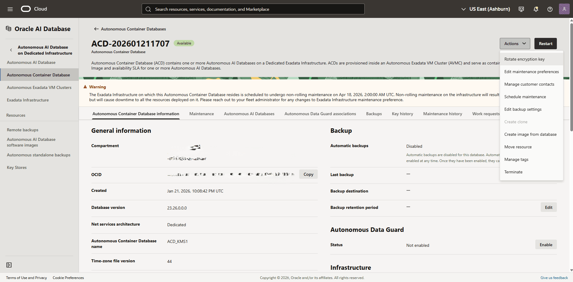 This screenshot shows how to rotate the encryption key of an Autonomous Container Database.