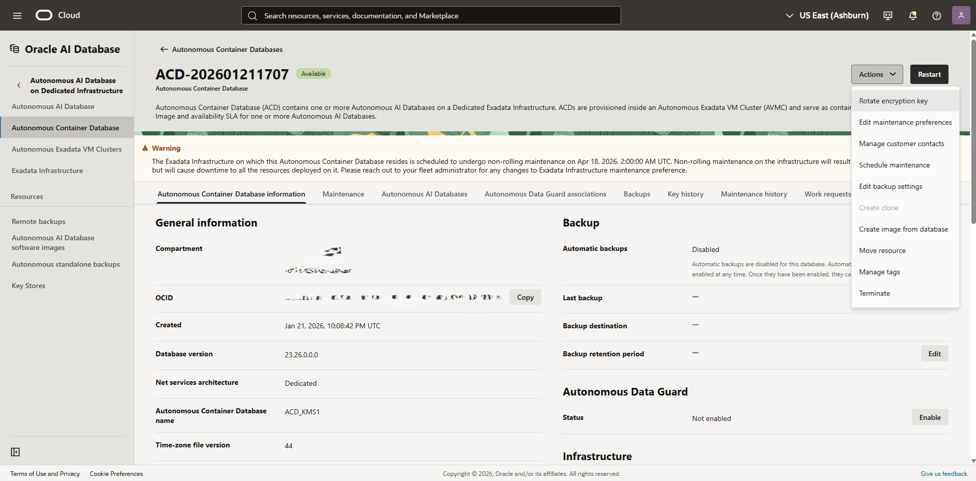This screenshot shows how to rotate encryption key of an Autonomous Container Database