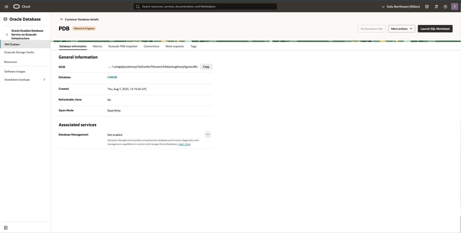 This screenshot shows how to perform a point-in-time restore on the Pluggable Database in the OCI.