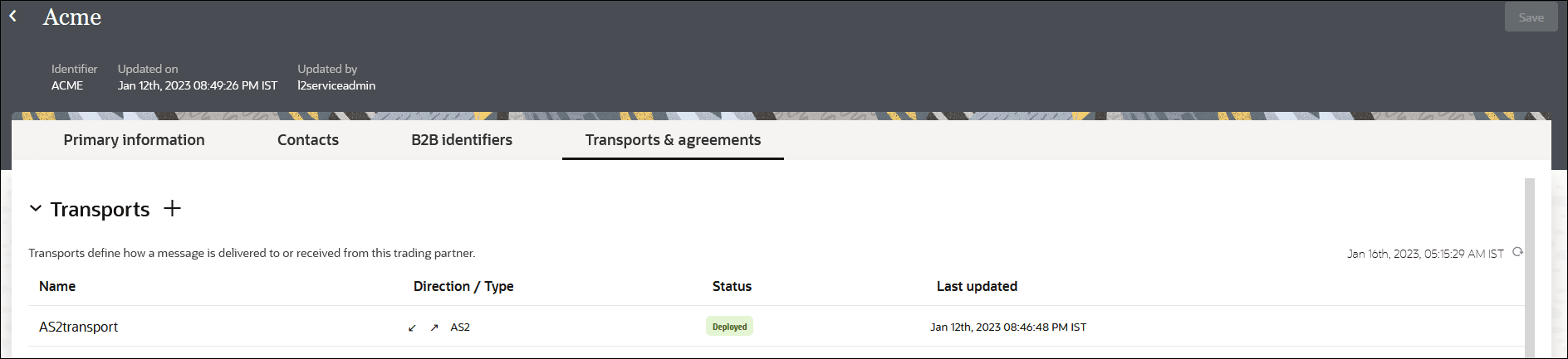 The Primary Information, Contacts, B2B Identifiers, and Transports & Agreements (which is selected) are shown. Below is the Transports section, with a + sign. Below is a table with columns for Name, Direction/Type, Status, and Last Updated. The Primary Information, Contacts, B2B Identifiers, and Transports & Agreements (which is selected) are shown. Below is the Transports section, with a + sign. Below is a table with columns for Name, Direction/Type, Status, and Last Updated.
