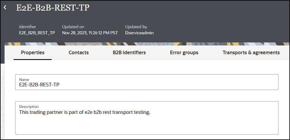 The Properties, Contacts, B2B Identifiers, and Transports & Agreements tabs appear at the top. Below are the Name and Description fields. In the upper right is the Save button.