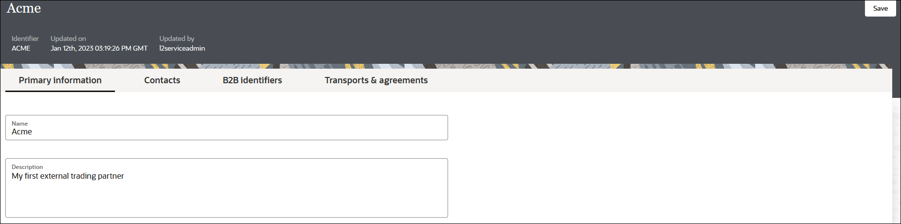 The Primary Information, Contacts, B2B Identifiers, and Transports & Agreements tabs appear at the top. Below are the Name and Description fields. In the upper right is the Save button.