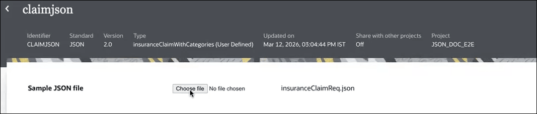The image shows the claimjson page. On top are the following metadata fields: Identifier (CLAIMJSON), Standard (JSON), Version (2.0), Type: insuranceCliamWithCategories Updated on (Date and time), Share with other projects (Off) and Project (JSON_DOC_E2E). Below, there is a section labeled “Sample JSON file” with a file upload control (“Choose file – No file chosen”). To the right, a filename is displayed: insuranceClaimReq.json.