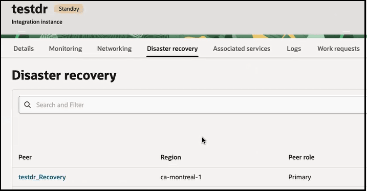 The instance name appears with the word Standby at the top. The Details, Monitoring, Networking, Disaster recovery (which is selected), Associated services, Logs, Work requests, and Tags tabs are shown. A Search field is shown. Below this is a table with columns for Peer, Region, and Peer role. The table shows that there is a testdr_Recovery instance in Montreal that is the primary instance.