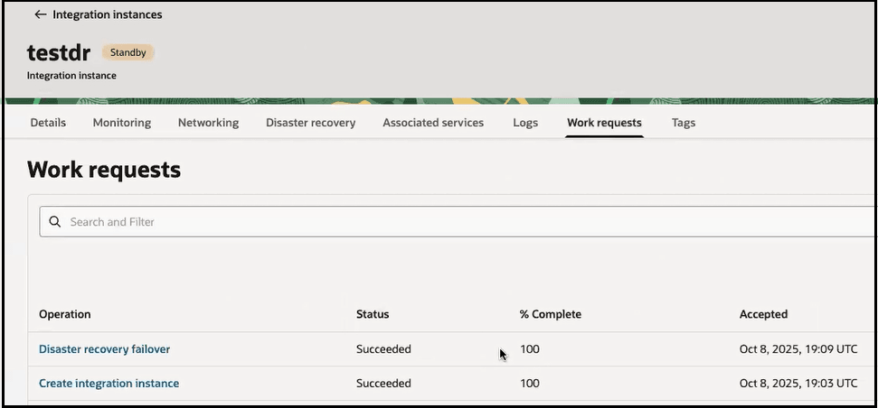 The instance name appears with the word Standby in progress appear at the top. The Details, Monitoring, Networking, Disaster recovery, Associated services, Logs, Work requests (which is selected), and Tags tabs are shown. Below this is a Search field. A table appears with columns for Operation, Status, % Complete, and Accepted. The completed disaster recovery failover and the original instance installation creation are the two operations shown.