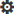 An image of the Settings menu icon, which is represented by a black cog.