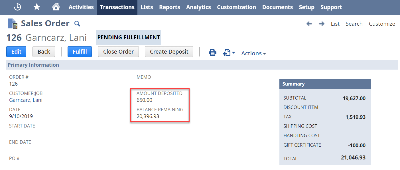 Sales order record with the updated custom Amount Deposited and Balance Remaining fields highlighted.