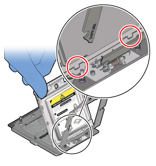 Figure showing the tabs inserted of the External Cap for motherboard returns.