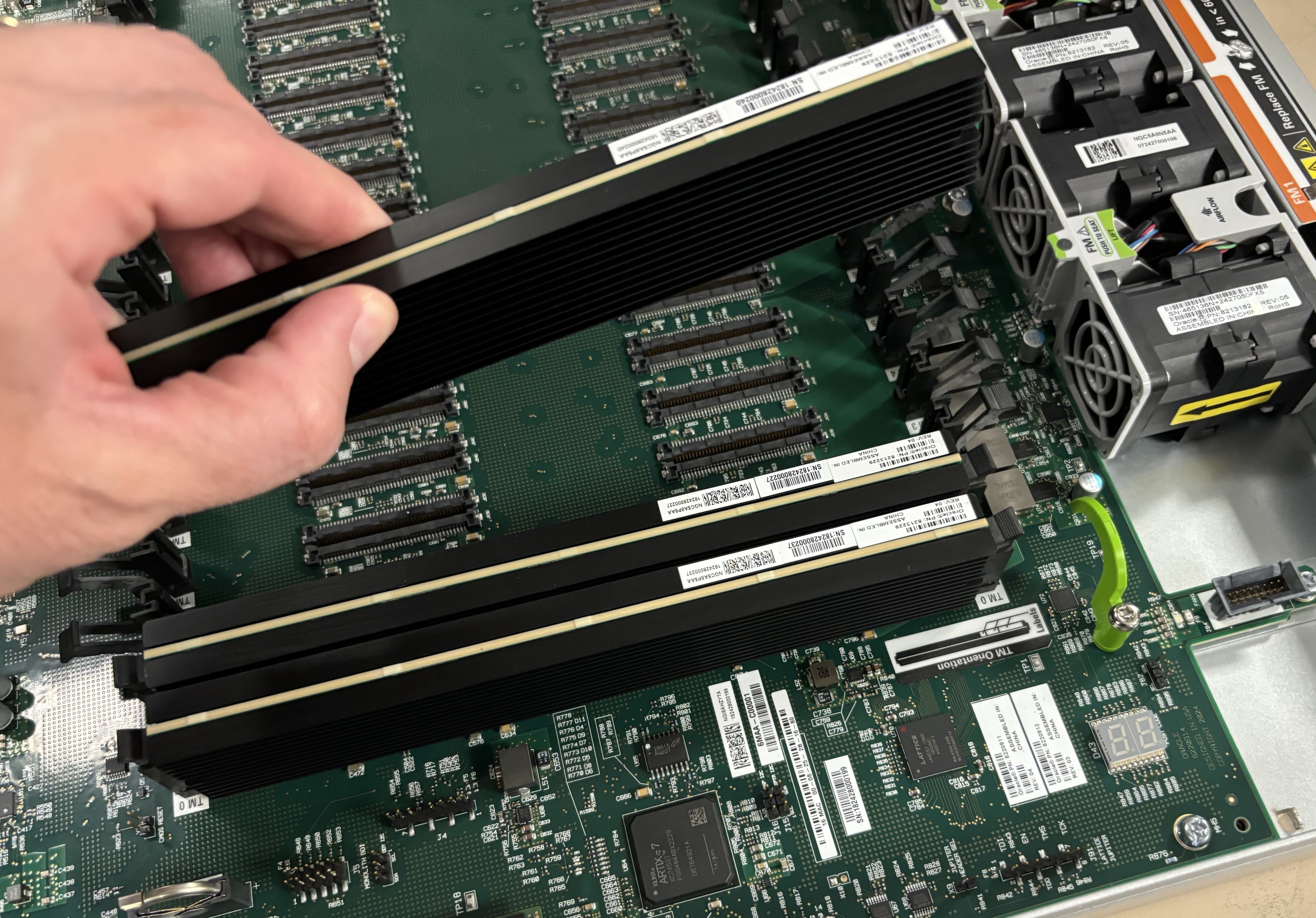 This picture shows someone removing the transcoding module.