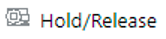 This image displays the Hold/Release button.
