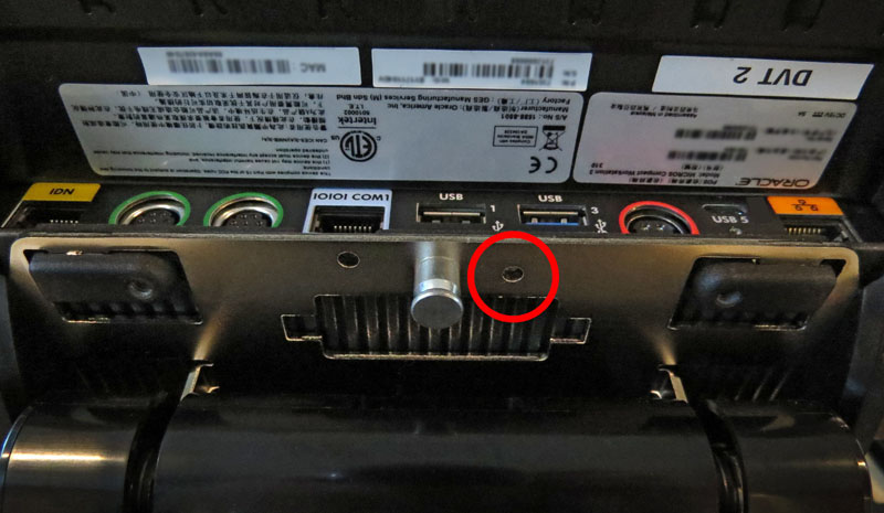 This image shows the location of the security screw hole on the Compact Workstation 310.