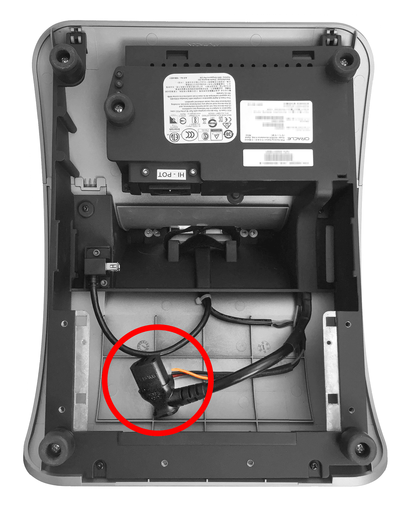 This figure shows the location of the C13 power cord in the Adjustable Stand.