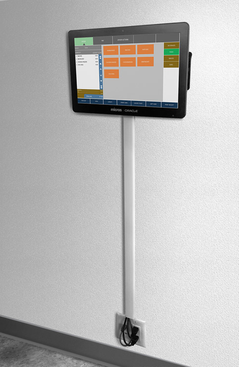 This figure shows a wall-mounted Workstation 6 Series workstation. This figure shows a wall-mounted Workstation 6 Series workstation.