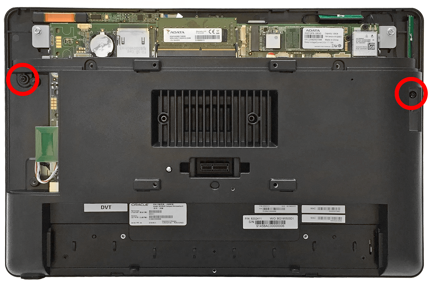 This figures shows the location of the screws in the magnetic stripe reader compartment and the expansion slot.