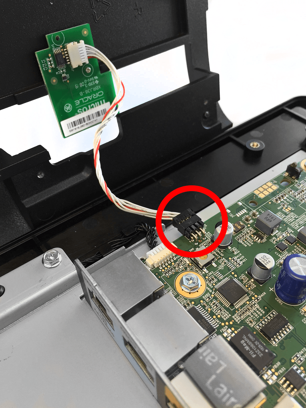 This figures shows the location of the RFID tag 8-pin modular cable and connector.