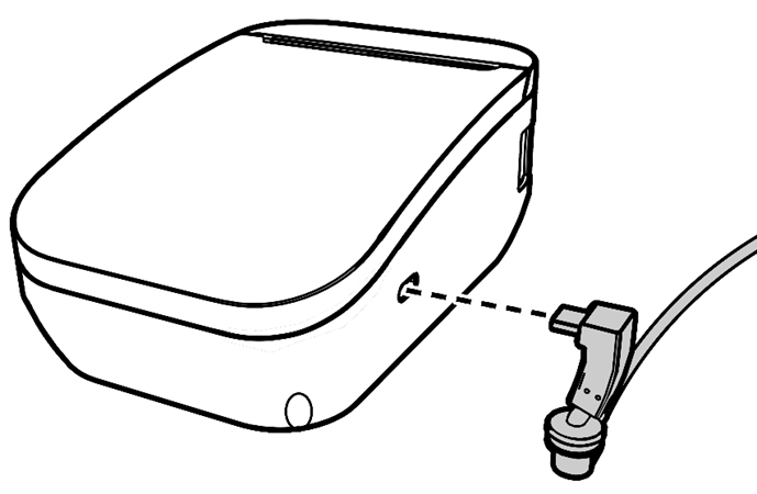 This image shows the USB cable being plugged in to the printer.