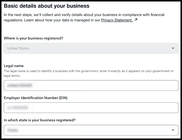 Business details form showing legal name, EIN, and registration state fields