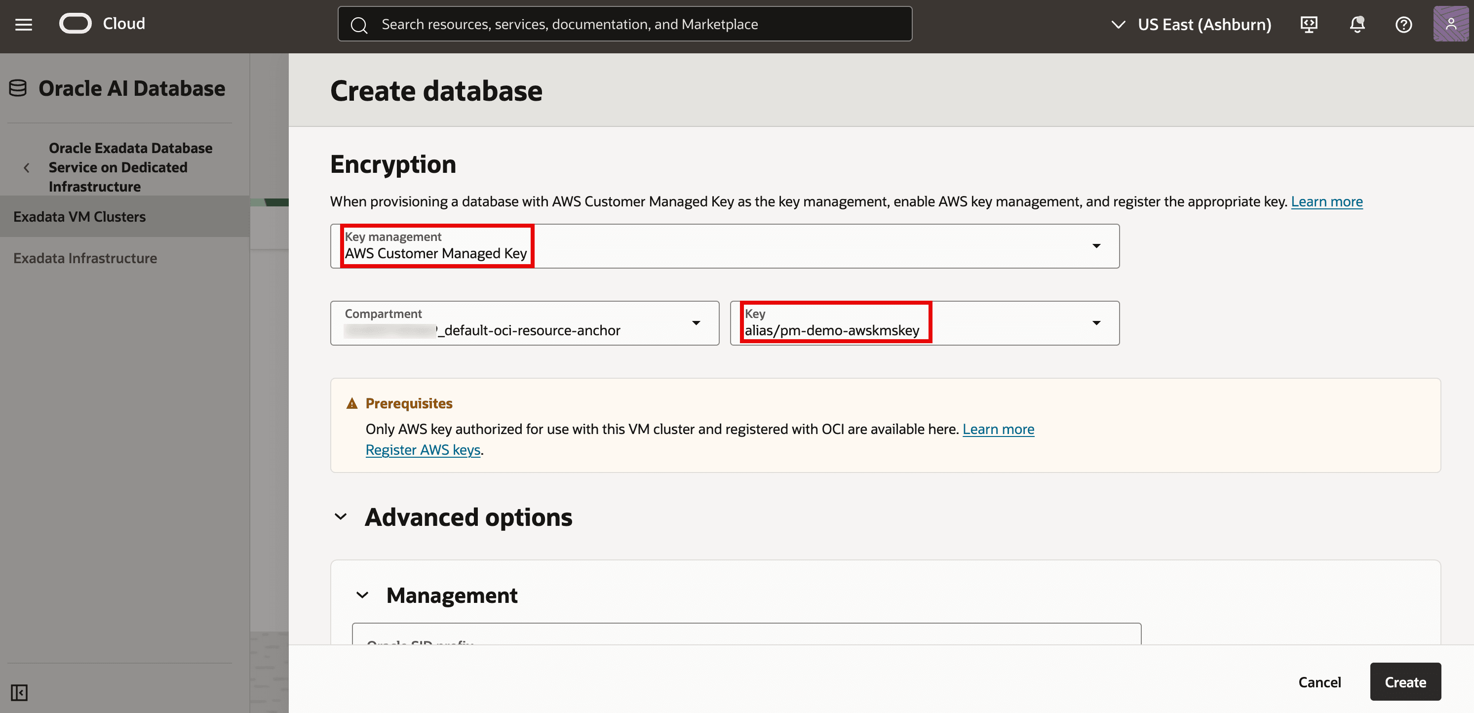 The screenshot shows the Create database page in the Oracle Cloud console, focused on the Encryption section. It has Key management set to AWS Customer Managed Key, and the selected AWS KMS key alias is alias/pm-demo-awskmskey (both highlighted). A prerequisites note indicates only AWS keys that are authorized for the VM cluster and registered with OCI can be chosen. At the bottom-right, the Create button would provision the database using these encryption settings.