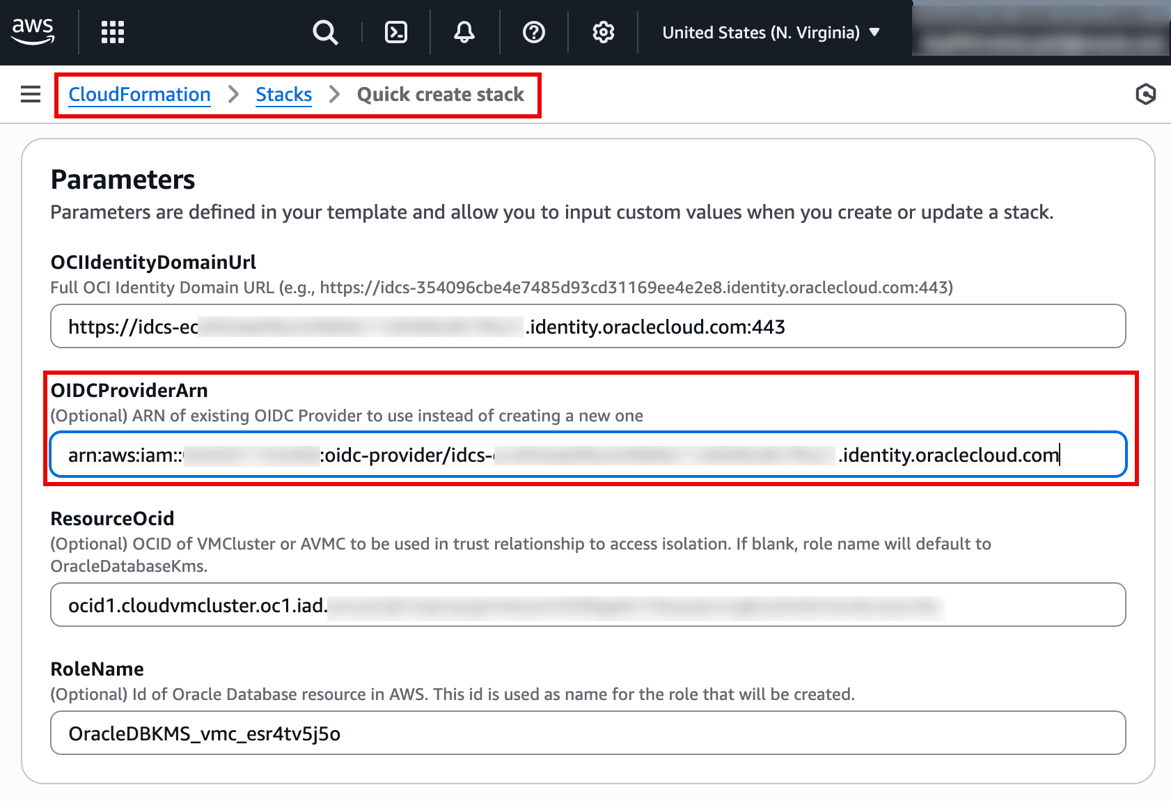 This screenshot shows the AWS CloudFormation “Quick create stack” page where you provide parameters for a template. It includes the OCI Identity Domain URL and a highlighted field for OIDCProviderArn, which is the ARN of an existing IAM OIDC provider (used instead of creating a new one). Additional parameters below (like ResourceOcid and RoleName) help scope the trust relationship and name the IAM role that will be created for the integration. Overall, it’s configuring the identity/trust setup needed for Oracle Database multicloud access (e.g., AWS KMS integration) via OIDC.