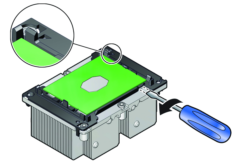 image:Figure showing a screwdriver being used to pry the                                             processor from the heatsink.