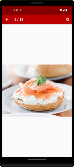 Questa immagine mostra l'anteprima di un bagel con crema di formaggio e salmone.