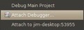 From the menu select the debug icon. From the drop down menu select Attach Debugger.